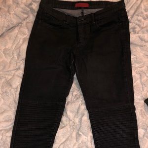 Black skinny jeans with textured knees